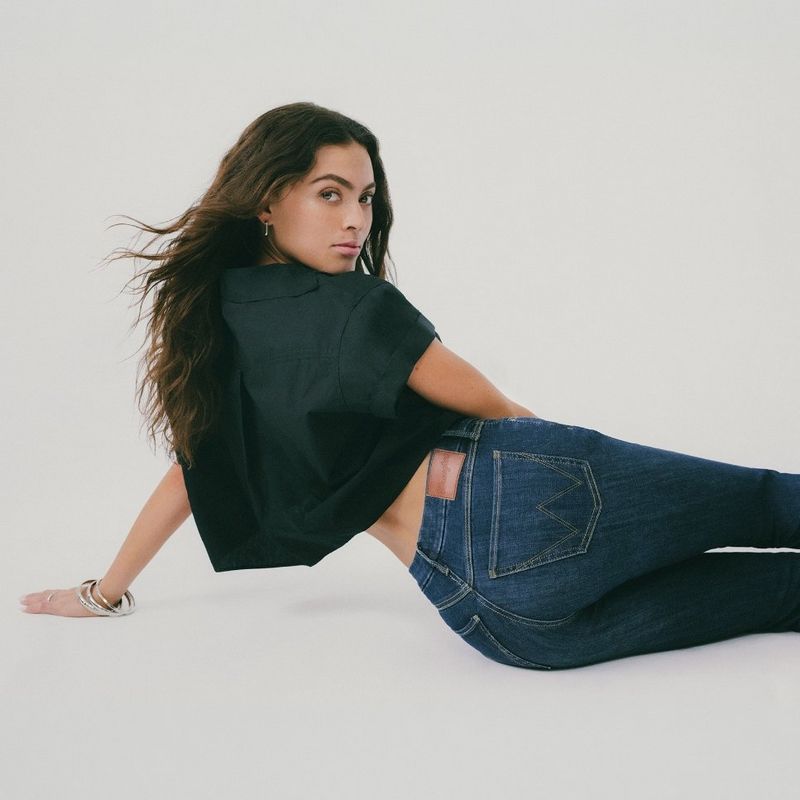 Studio shot of woman wearing BESPOKE jeans.