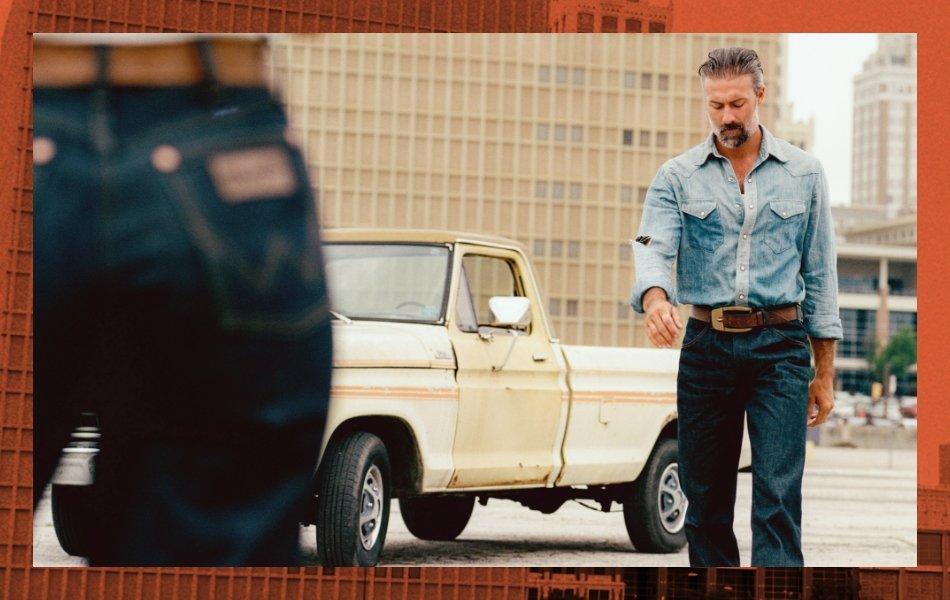 a man walking toward the camera wearing Wrangler x Imogene + Willie apparel.
