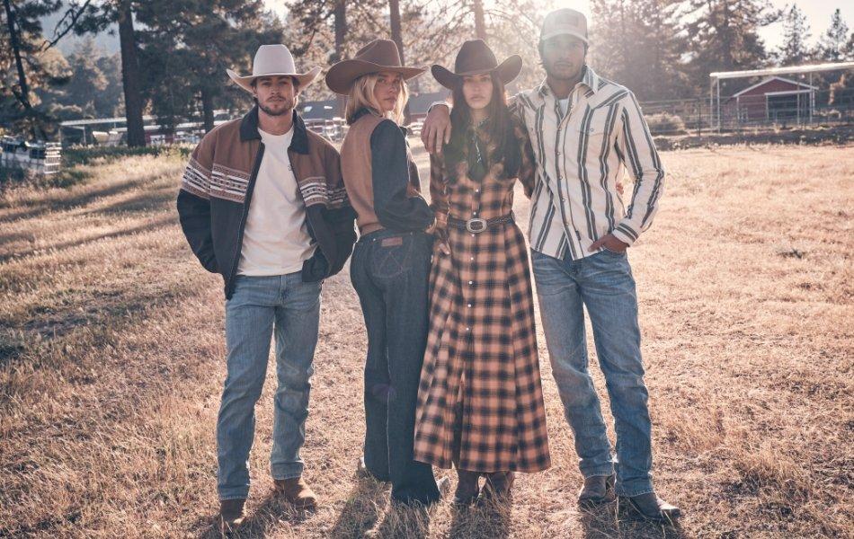 a group of people wearing Wrangler's Fall collection and looking at the camera.