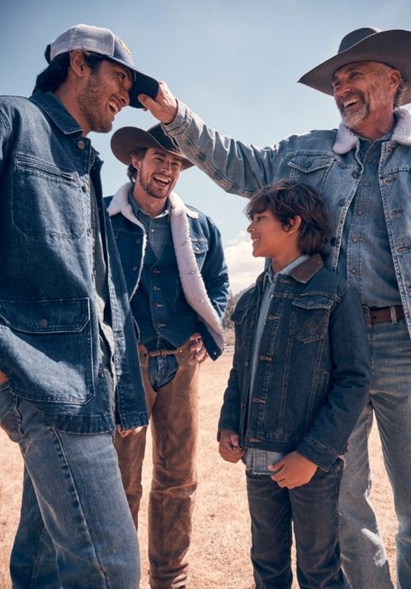 Grandfather, father and grandson wearing denim, laughing outdoors - shop iconic denim