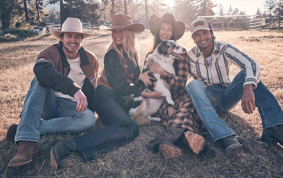 Guys and girls sitting with dog