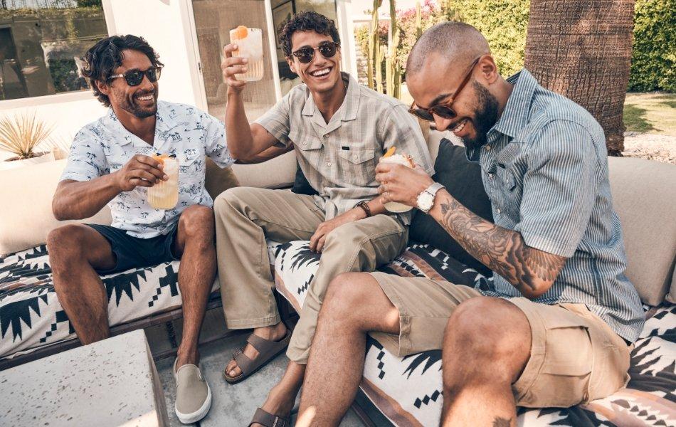 three guys hanging out wearing Wrangler apparel