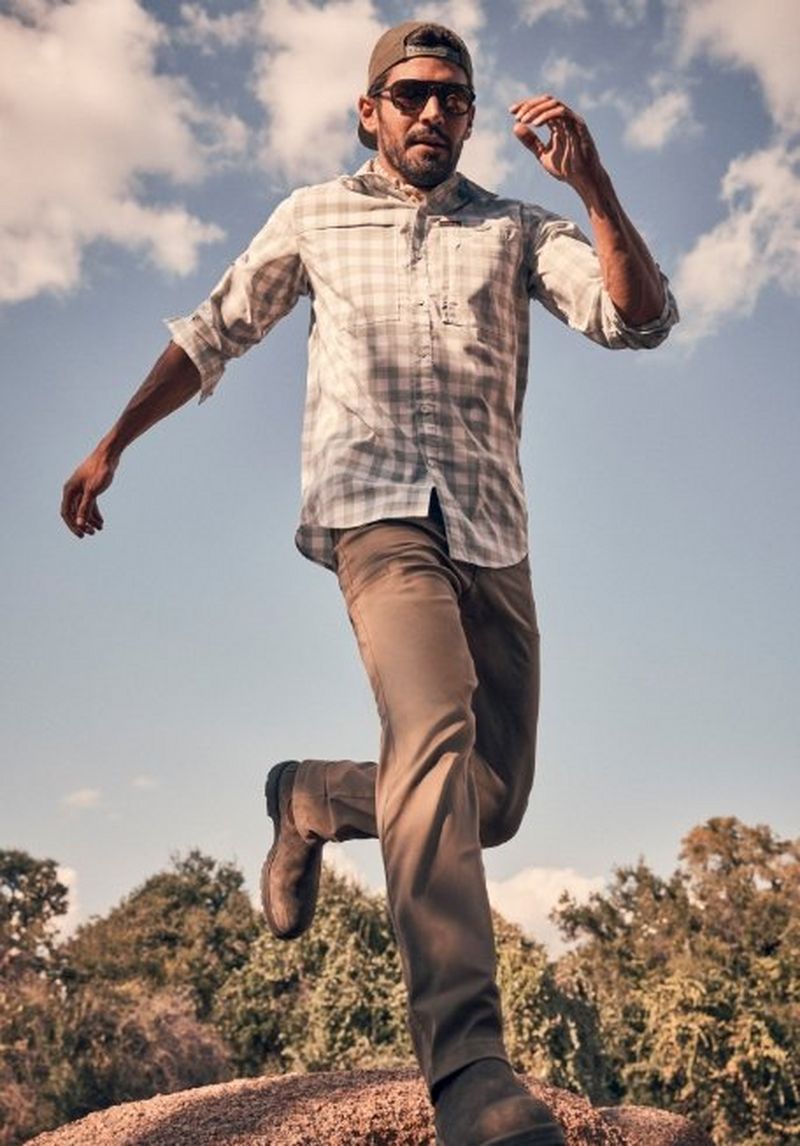 Guy jogging through the forest - Shop Pants