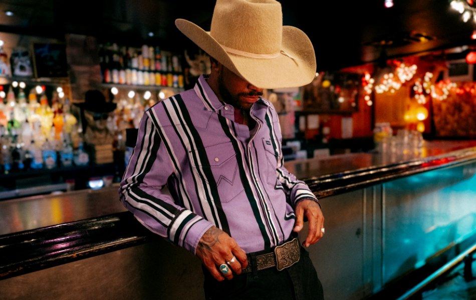 Angel White wearing brushpopper and a cowboy hat