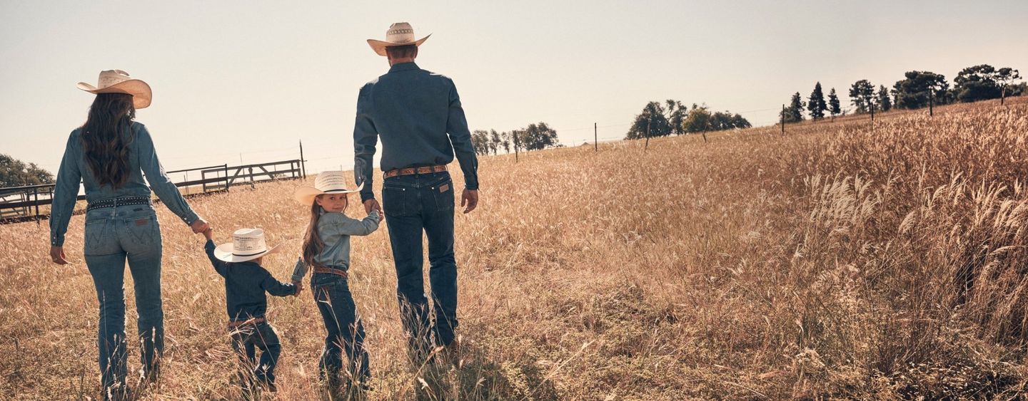 Family of 4 walking through a wheat field - Father's Day