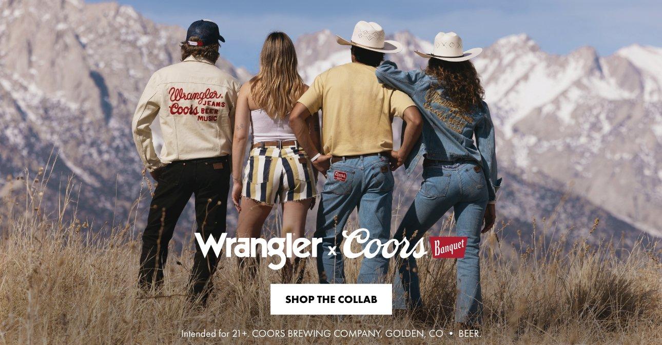 group of friends in a field wearing Wrangler x Coors Banquet apparel facing away from the camera | Shop Wrangler x Coors Banquet