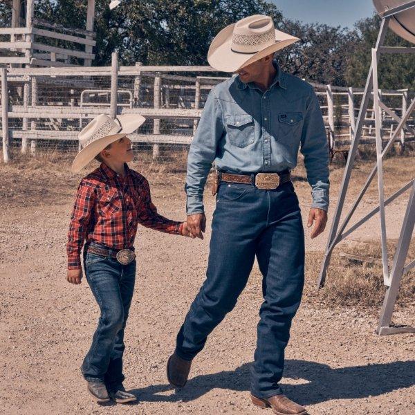 Father and son holding hands at the rodeo - Shop Father's Day