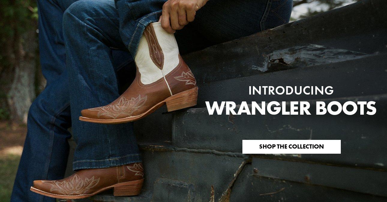 woman pulling on brown and white leather boot - Shop Wrangler Footwear Collection