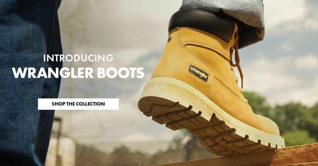 work boot shown walking up stairs- Shop Wrangler Footwear Collection