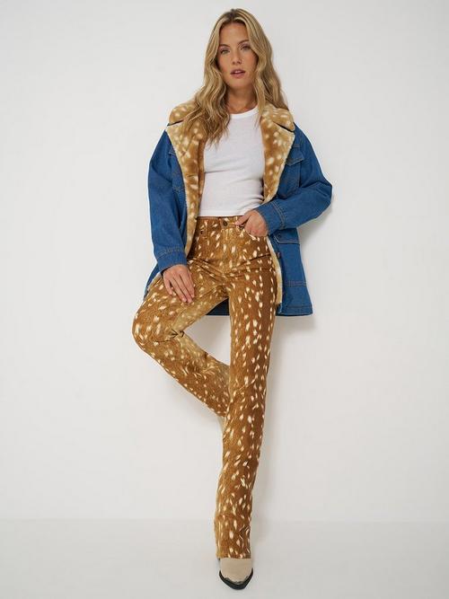 Women wearing Wrangler bootcut jeans