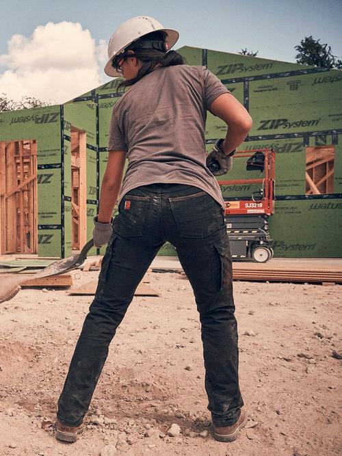 Woman in technical work pants