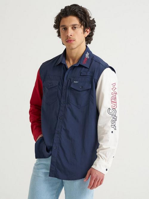 Man wearing long sleeve Wrangler red white blue performance shirt 