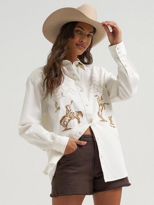 Women wearing white wrangler button down