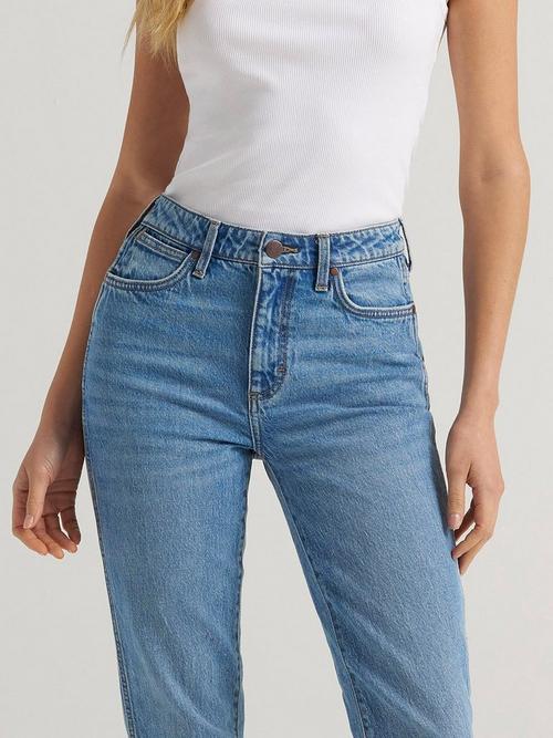 A women's torso showing Wrangler high rise jeans