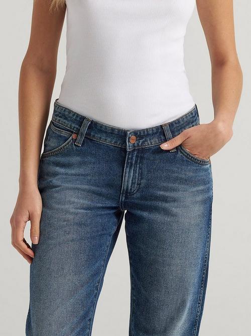 A women's torso showing Wrangler low rise jeans