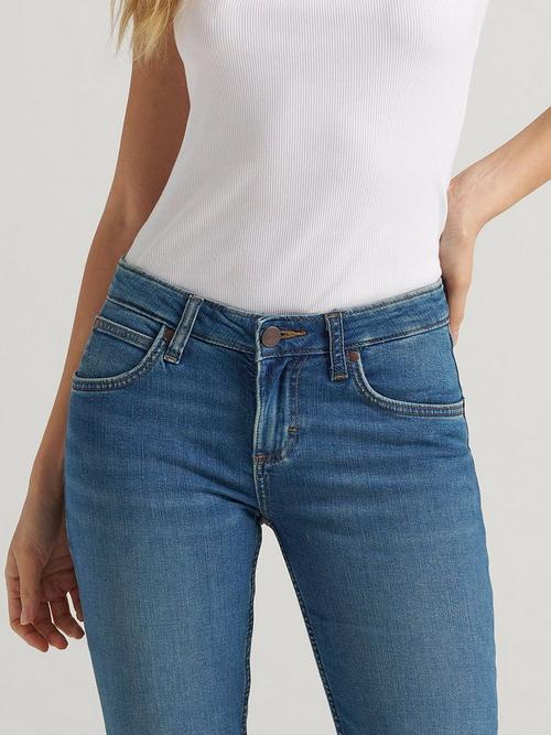 A women's torso showing Wrangler mid rise jeans